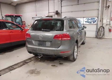 2014 Volkswagen Touareg 3.6L Sport z USA, uszkodzony, nr VIN WVGEF9BP3ED012285